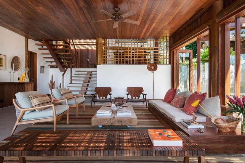 Cozy tropical living room with wooden decor