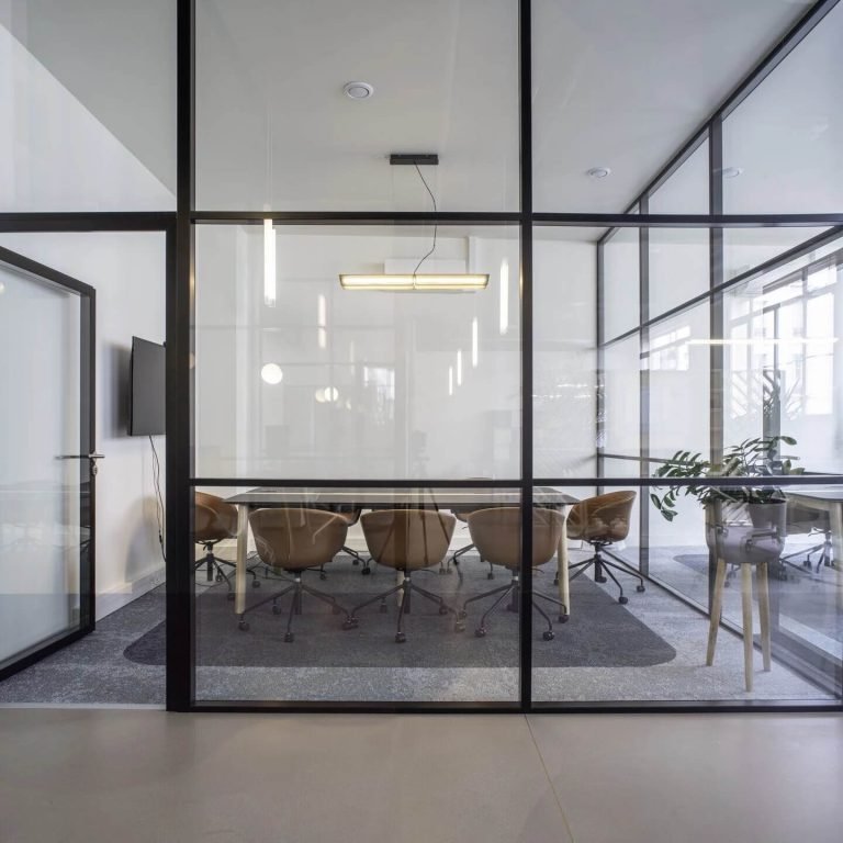 Meeting rooms with AV, stone surfaces and task lighting